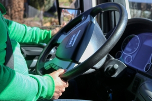 truck driver holding steering wheel