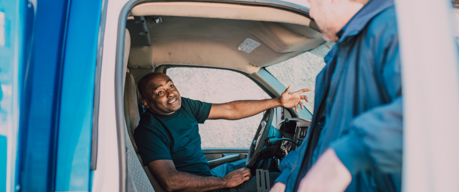 two men in a truck