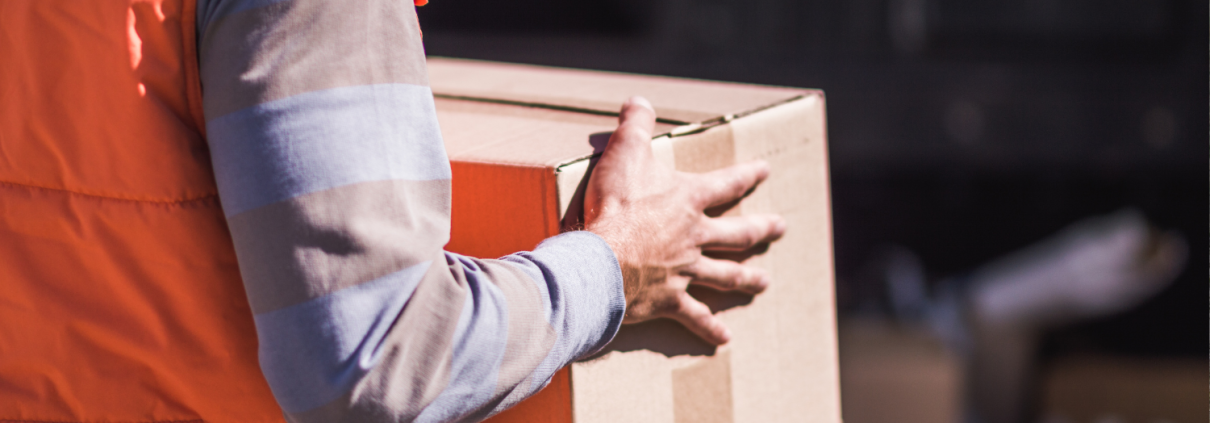 delivery man holding package