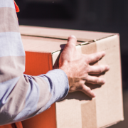 delivery man holding package